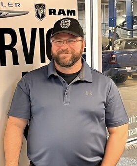 Staff member G.A. Christiansen from 56d9380dbd1d