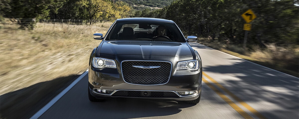 Chrysler 300 driving down the road