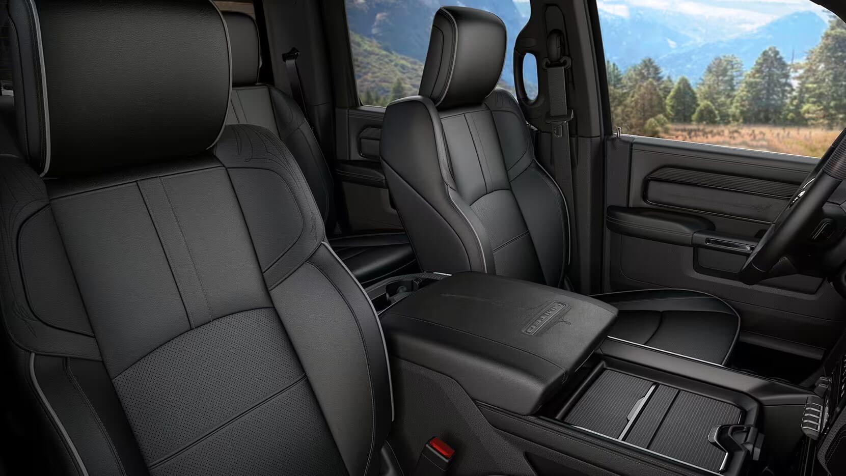 Learn which Ram models feature heated and cooled seats, like the Ram 2500. Interior shot of the Ram 2500, showing the front seats, which can have heated and cooled seats based on trim and add-on package availability.