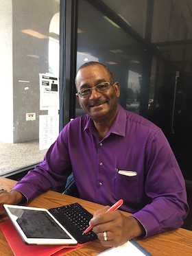 Staff member Carlyle Cooper from 37d085f85013