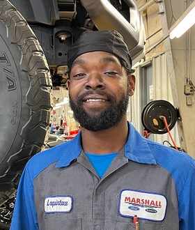 Staff member Quint Robertson from 525f3969e059