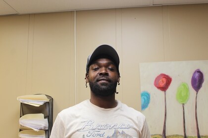 Staff member Quint Robertson from 525f3969e059