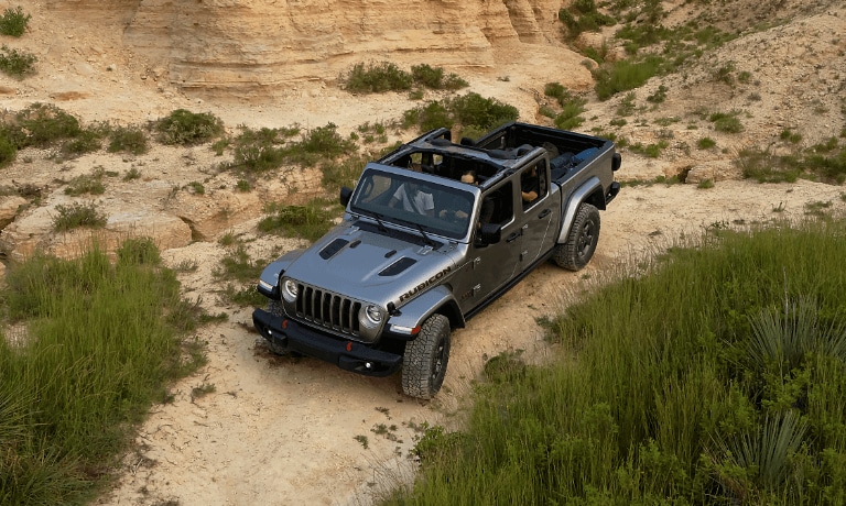 2020 Jeep Gladiator driving down rocky path