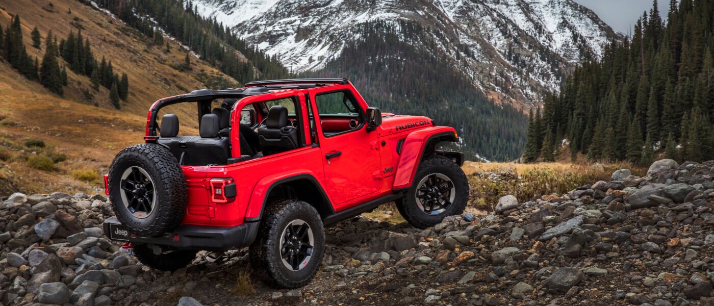 2021 Jeep Wrangler off-road by a mountain