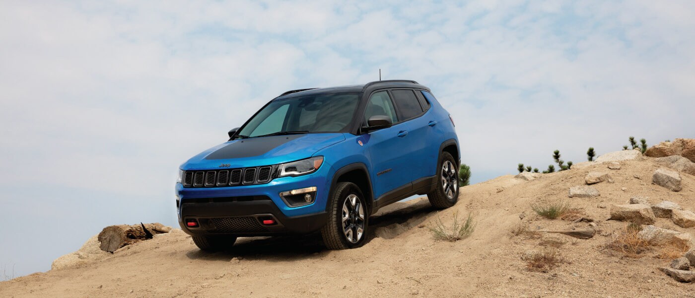 2020 Jeep Compass driving on sand