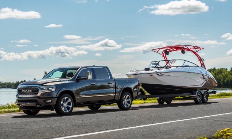 2023 Ram 1500 exterior towing a boat