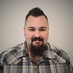 Staff member Justin Blancett from ID_96980a199d65