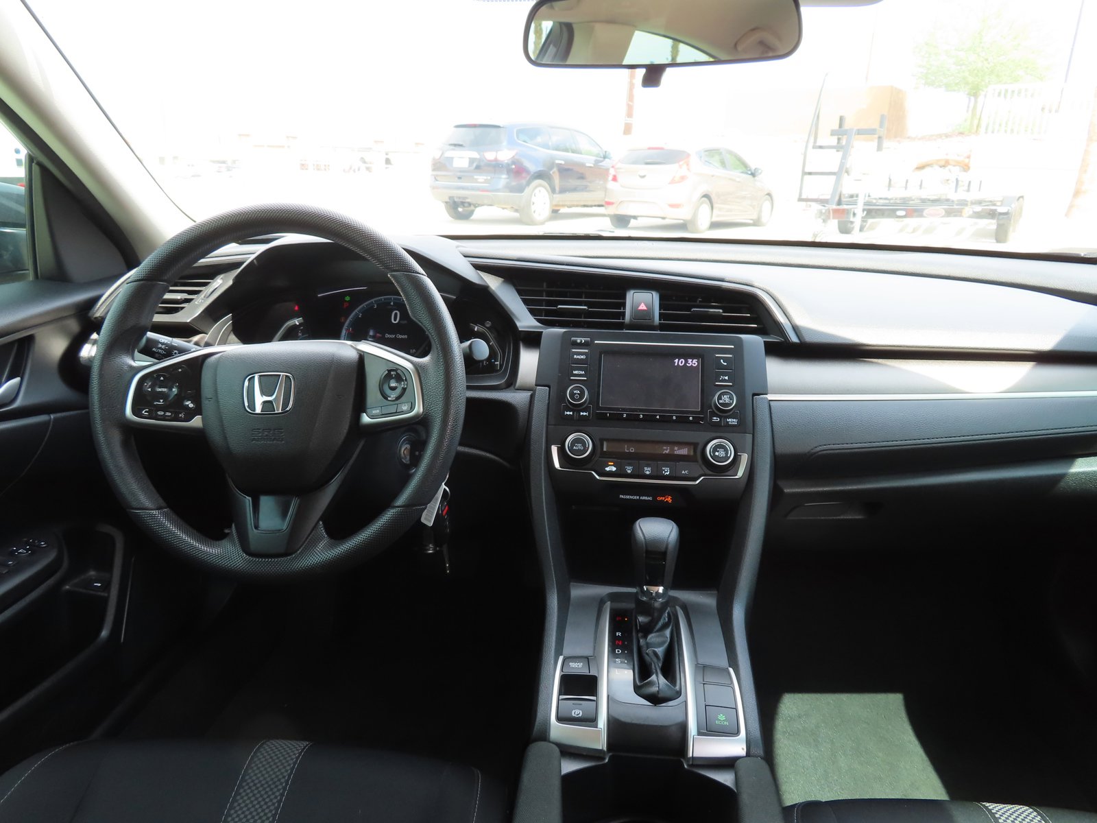 Used 2021 Honda Civic LX with VIN 2HGFC2F66MH553084 for sale in Kingman, AZ