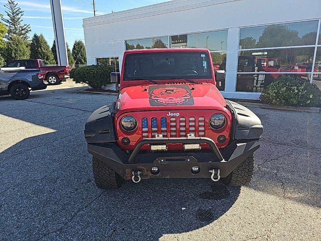 Used 2012 Jeep Wrangler Unlimited Sport with VIN 1C4BJWDG8CL112256 for sale in Mason City, IA