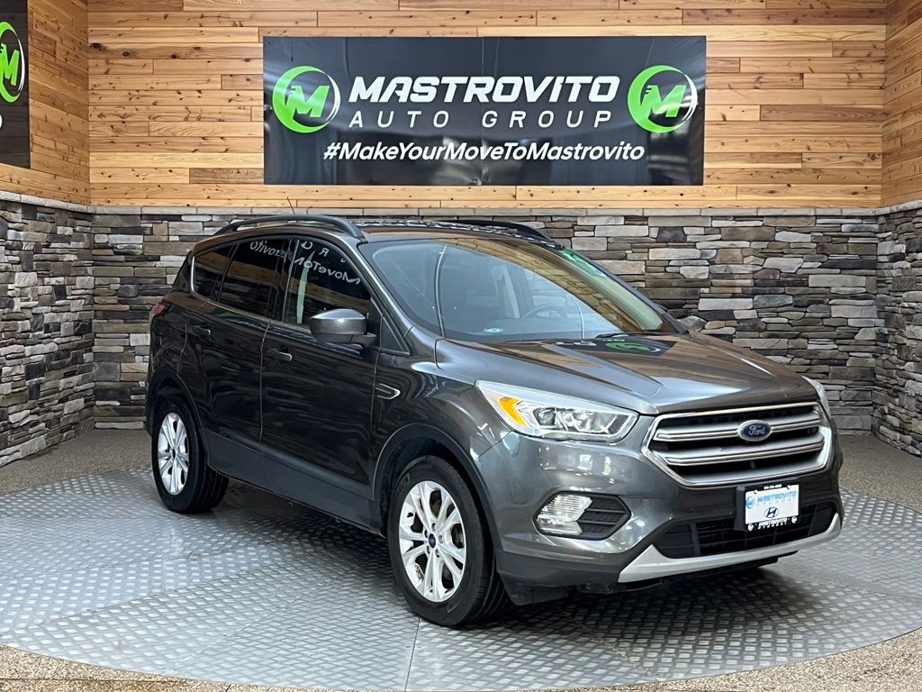 Used 2017 Ford Escape SE with VIN 1FMCU9GDXHUD14639 for sale in New York Mills, NY