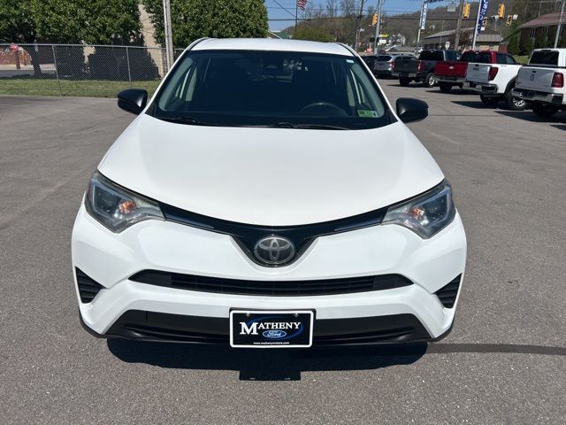 Used 2018 Toyota RAV4 LE with VIN JTMBFREV4JD250545 for sale in Saint Marys, WV