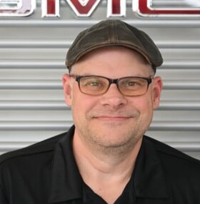 Staff member Christopher Ladeaux  from ID_49eb6134c540