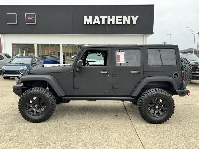 Used 2016 Jeep Wrangler Unlimited Sahara with VIN 1C4BJWEGXGL100680 for sale in Parkersburg, WV