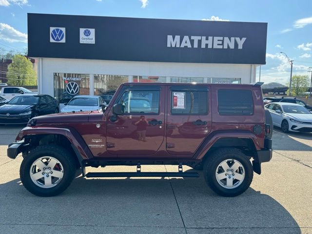 Used 2010 Jeep Wrangler Unlimited Sahara with VIN 1J4HA5H19AL145848 for sale in Parkersburg, WV
