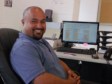 Staff member Juan Castillo from 6fe51a207bae