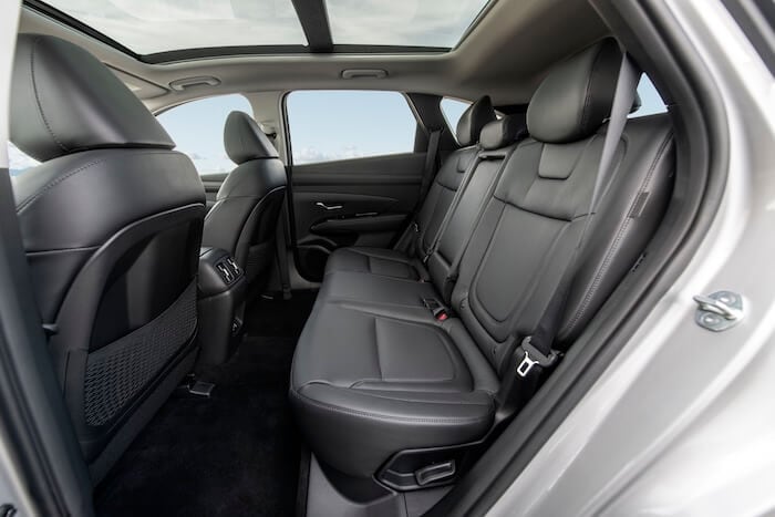2026 Hyundai Tucson rear seating with spacious second-row passenger room
