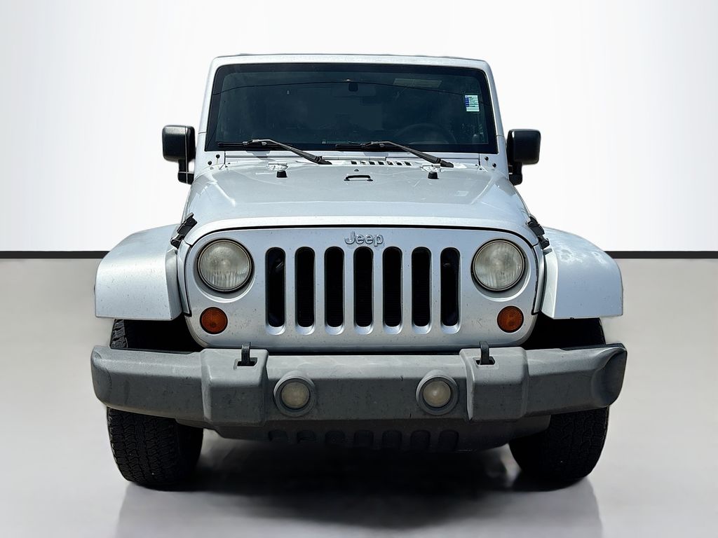 Used 2007 Jeep Wrangler Unlimited Sahara with VIN 1J4GB59147L118878 for sale in Metairie, LA