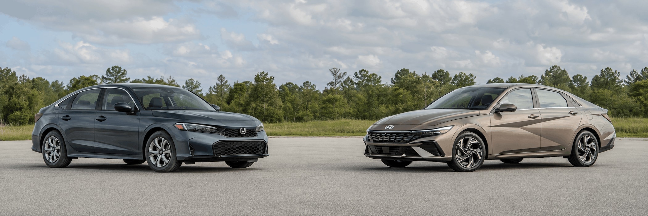2026 Hyundai Elantra and Honda Civic sedans facing each other