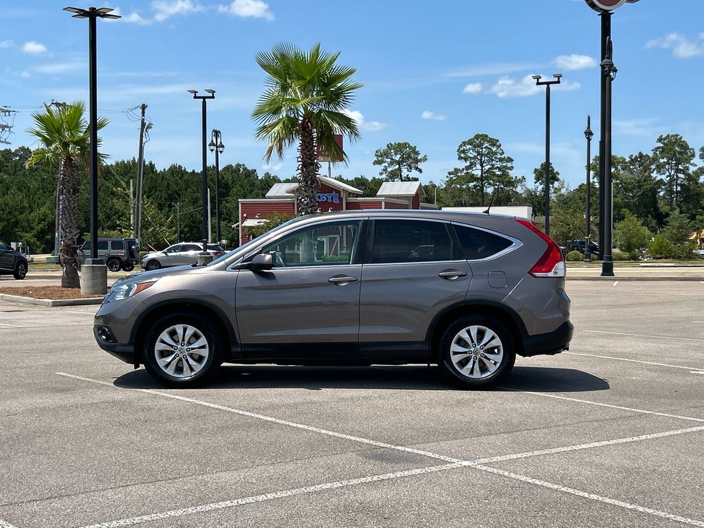 Used 2014 Honda CR-V EX with VIN 3CZRM3H59EG700142 for sale in D'Iberville, MS