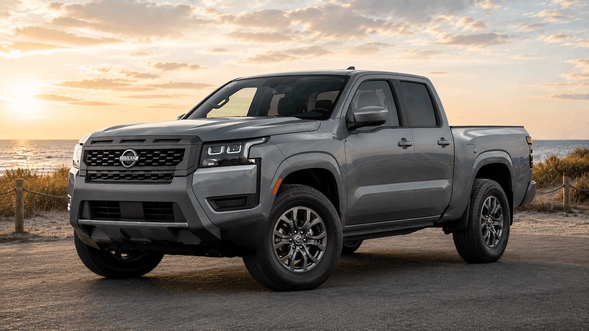 Gray 2026 Nissan Frontier SV Crew Cab parked near the coast