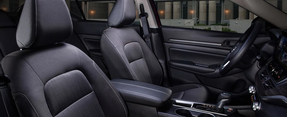 Front seats and interior of the 2026 Nissan Altima showing the comfortable cabin design