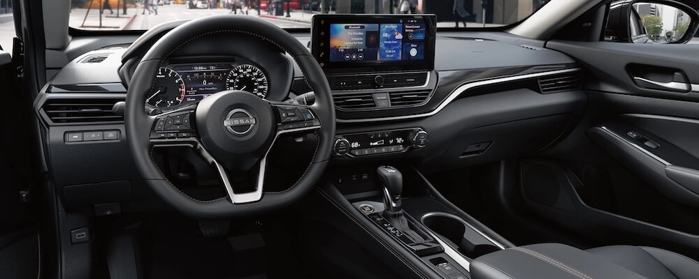 Dashboard of the 2026 Nissan Altima featuring the available 12.3-inch touchscreen and driver-focused cockpit