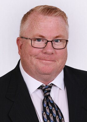 Staff member John Columbia from ID_6216d909359a