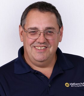 Staff member Seamus McNally from ID_d3129af30c64