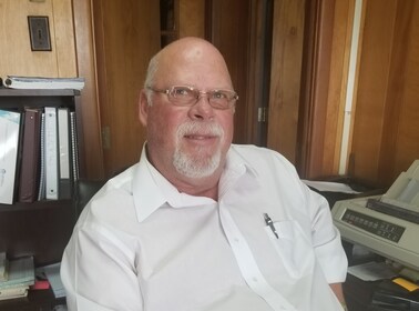 Staff member Denny Moore from 959ea2edc67d