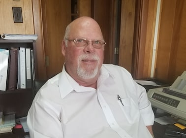 Staff member Denny Moore from 959ea2edc67d