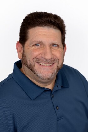 Staff member Paul Tirinato from ID_c49be202dc80