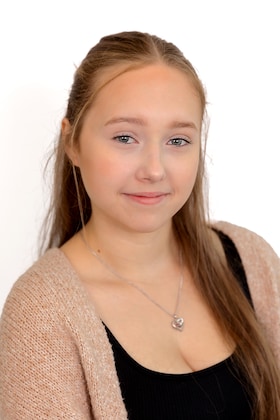 Staff member Dina Ribeca from ID_7d4ad6965b7d