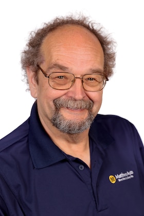 Staff member John Norovich from ID_4f7f8dcdce76