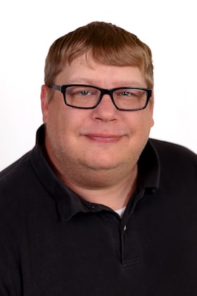 Staff member Christopher Smith from ID_f2bf14bb4d31
