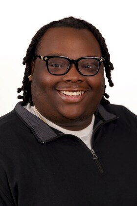 Staff member Quran Smith  from ID_15afbff5d372