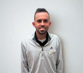 Staff member Eric Bauer from ID_704f4b0bdf85