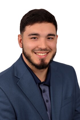 Staff member Aaron Revette from ID_d3f99fb0d815