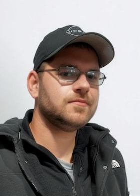 Staff member Cory Laris from ID_d3f99fb0d815