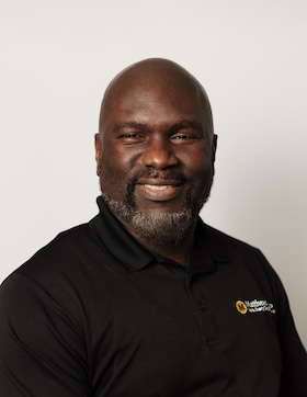 Staff member Edwin Dube from ID_f6fed33950c8