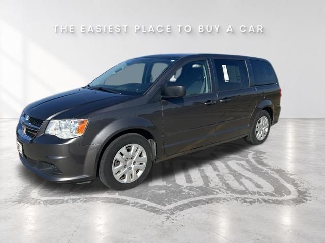 Used 2016 Dodge Grand Caravan SE with VIN 2C4RDGBG3GR184980 for sale in Kansas City