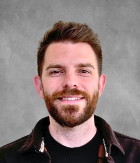Staff member Jacob Stanton from 9ad85b66e1bd