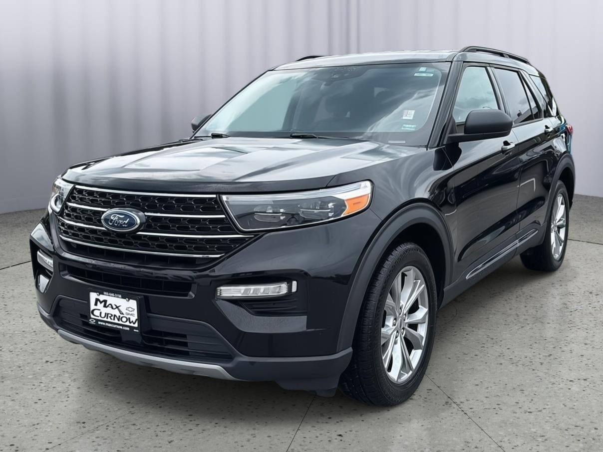 Used 2021 Ford Explorer XLT with VIN 1FMSK8DH5MGA29309 for sale in Kansas City