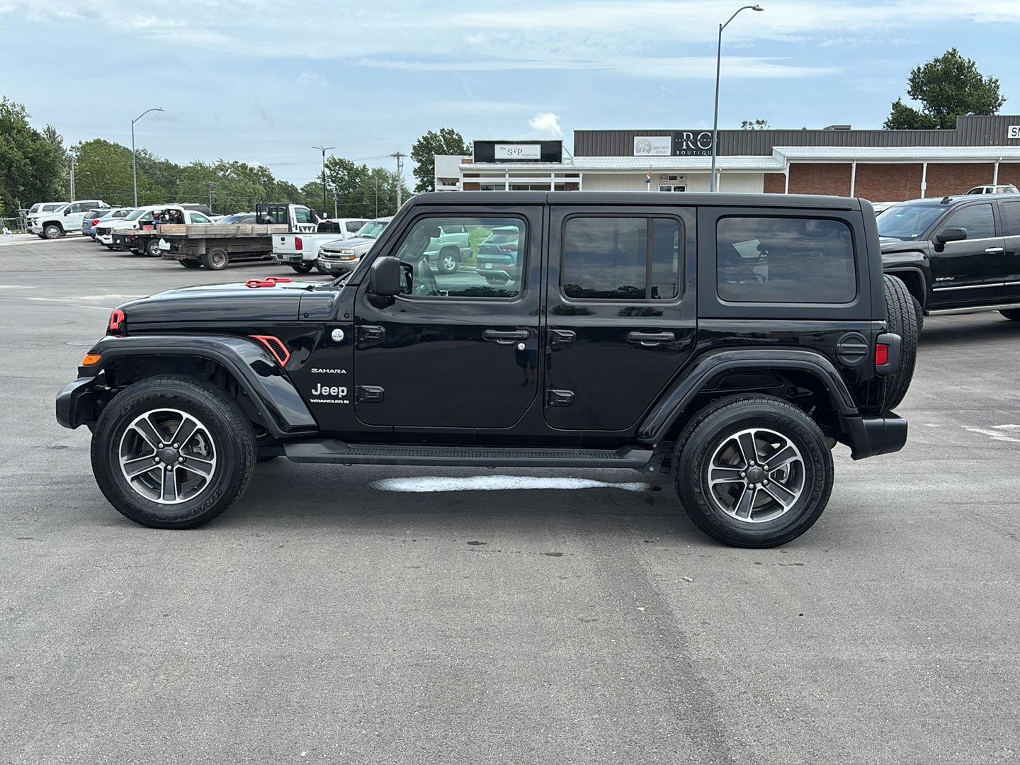 Used 2023 Jeep Wrangler 4-Door Sahara with VIN 1C4HJXEG0PW601219 for sale in Kansas City
