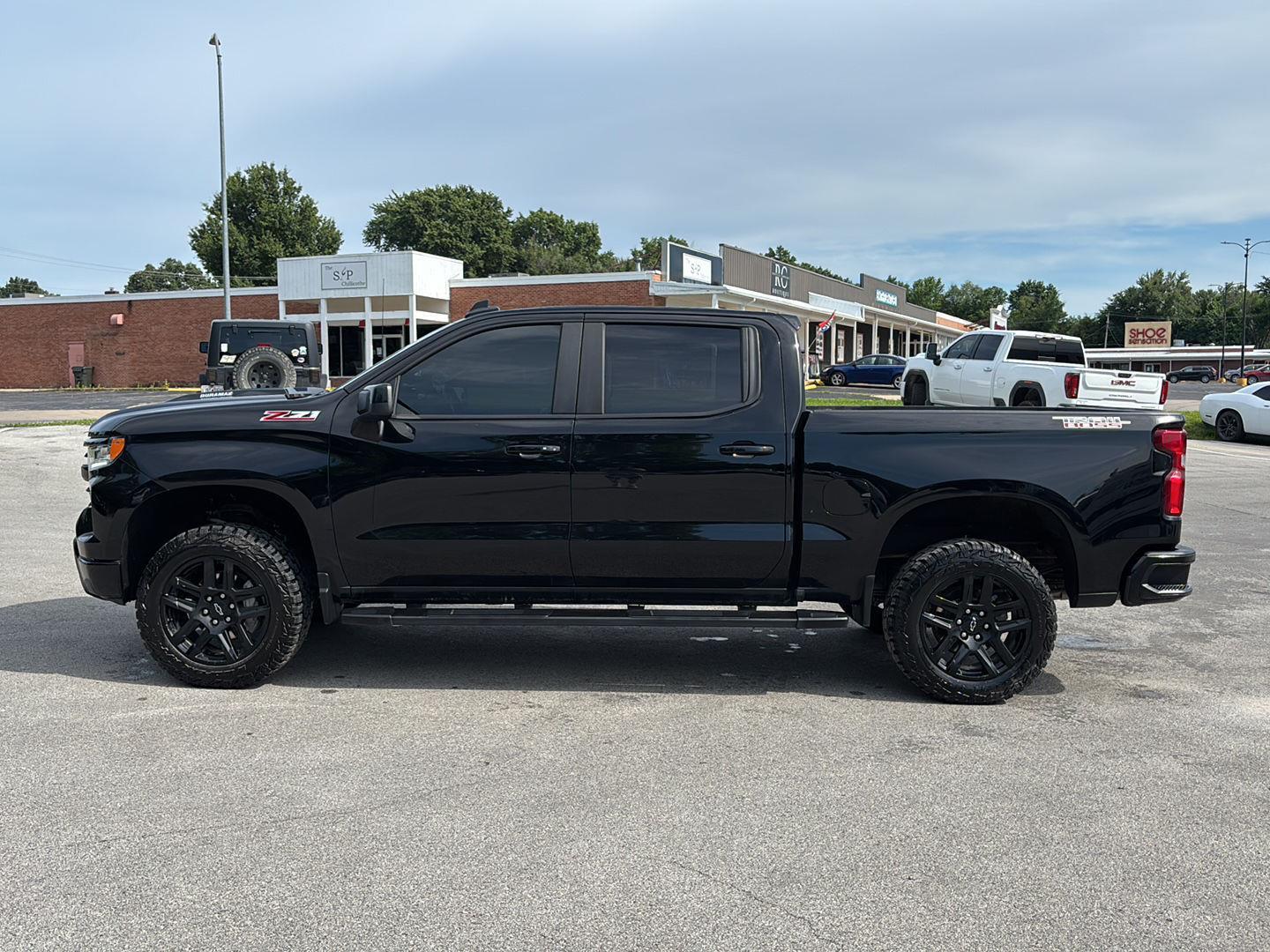 Used 2025 Chevrolet Silverado 1500 LT Trail Boss with VIN 3GCUKFE83SG128874 for sale in Kansas City