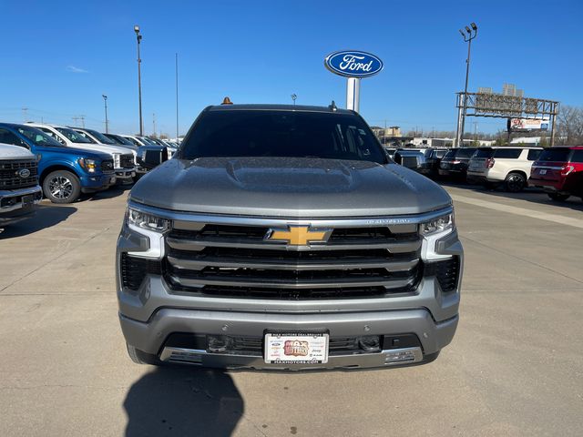 Used 2024 Chevrolet Silverado 1500 High Country with VIN 1GCUDJE83RZ148694 for sale in Harrisonville, MO