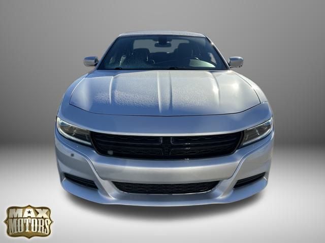 Used 2022 Dodge Charger SXT with VIN 2C3CDXBG8NH197107 for sale in Kansas City