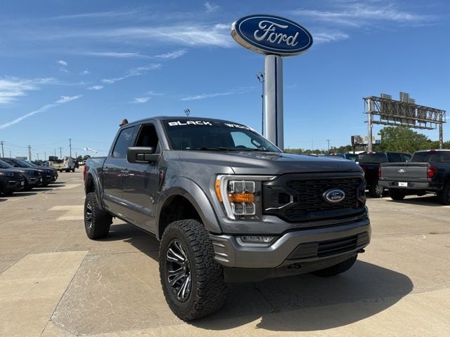 Used 2021 Ford F-150 XLT with VIN 1FTFW1E51MFA55000 for sale in Harrisonville, MO