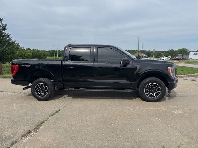 Used 2023 Ford F-150 XLT with VIN 1FTEW1EP7PFA77875 for sale in Kansas City