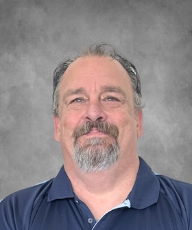Staff member James Dignan from 648d7de0cefd