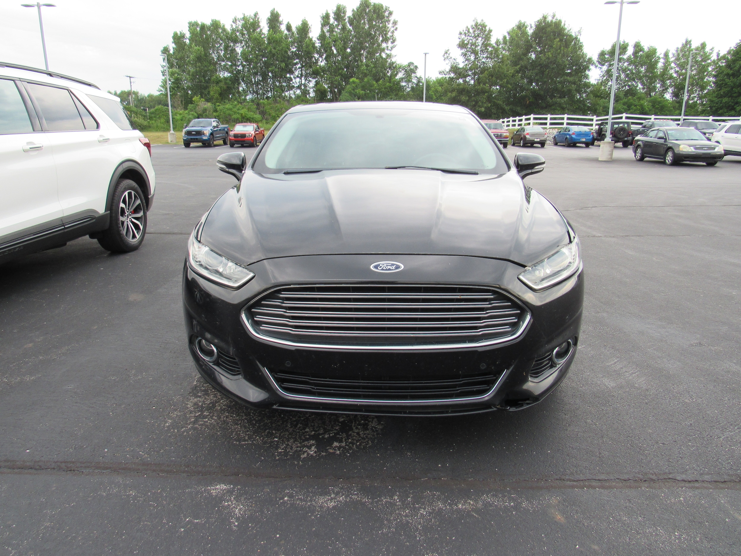 Used 2014 Ford Fusion Titanium with VIN 3FA6P0RU1ER233135 for sale in Kendallville, IN